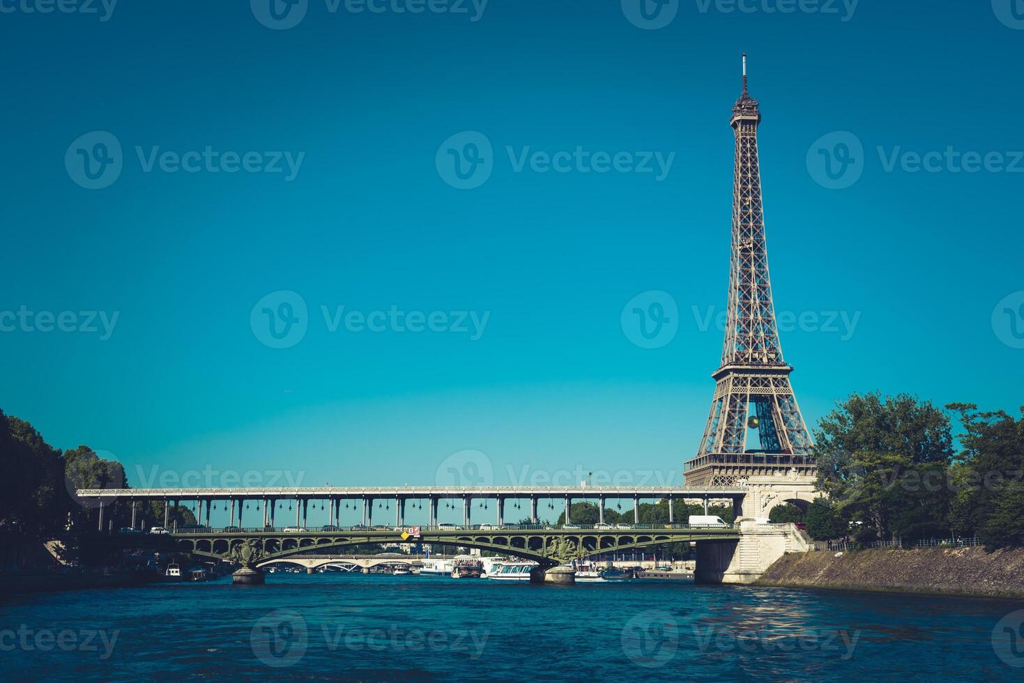 The Eiffel tower and the Seine river photo