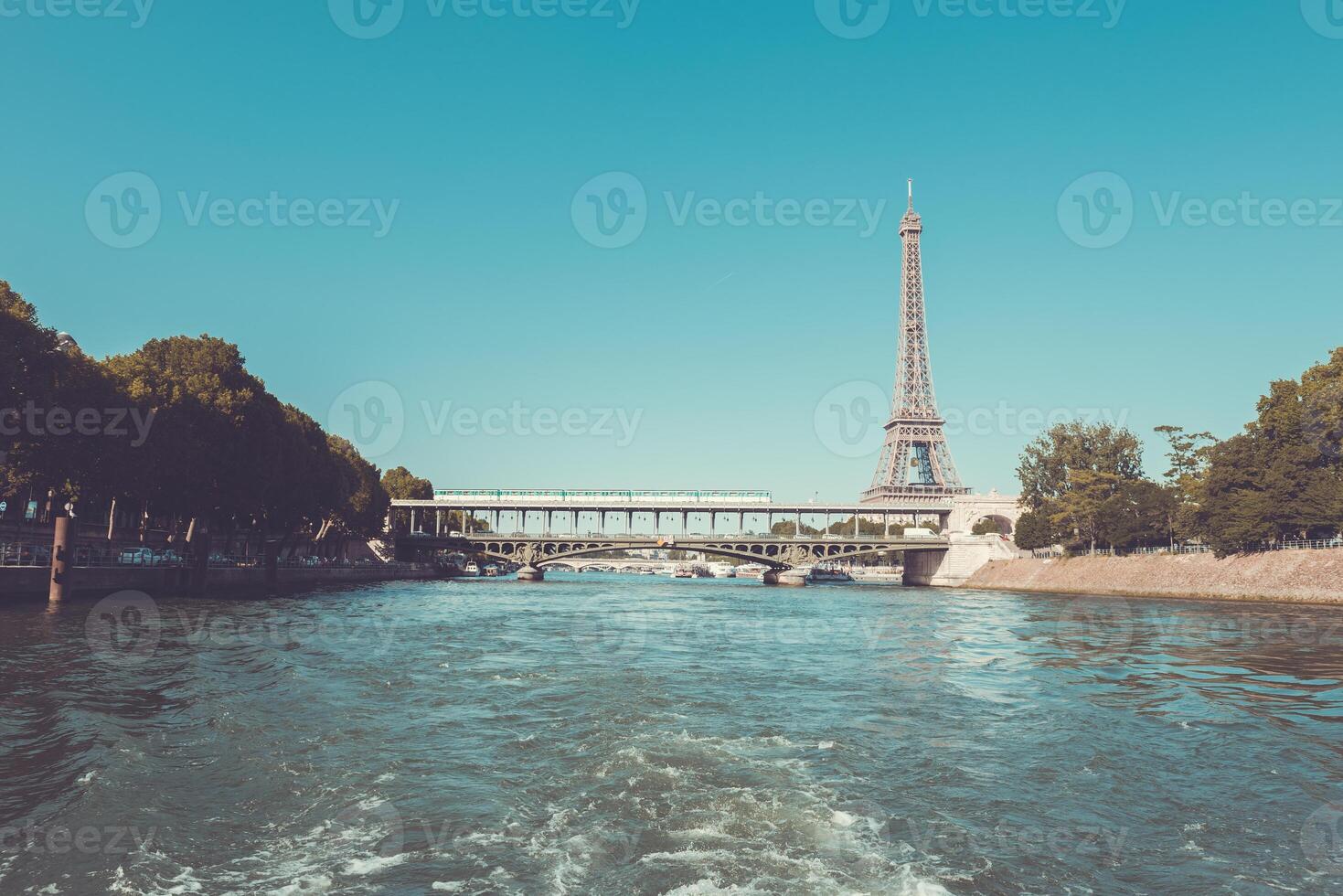The Eiffel tower and the Seine river photo