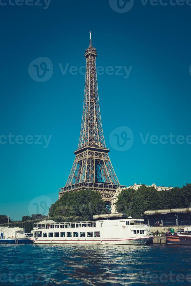 The Eiffel tower and the Seine river photo