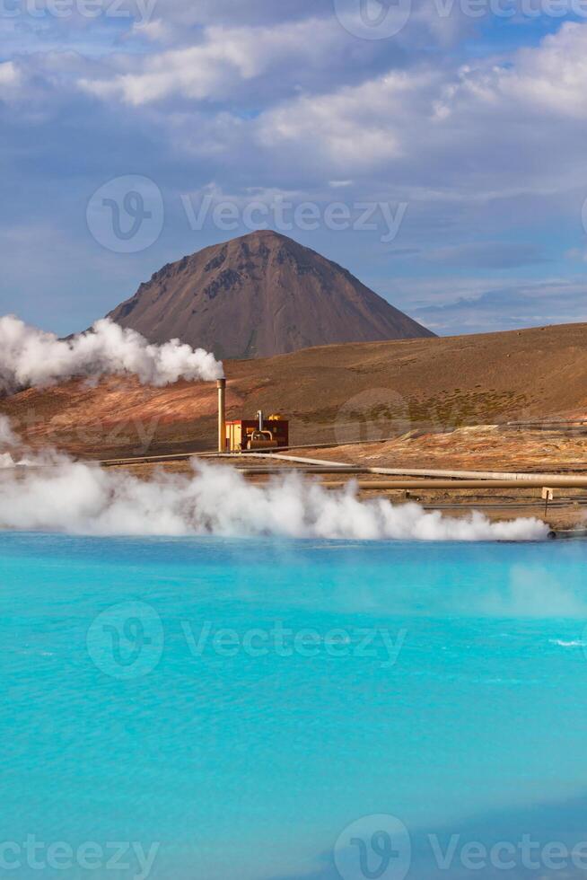 Geothermal Power Station and Turquoise Lake in Iceland photo