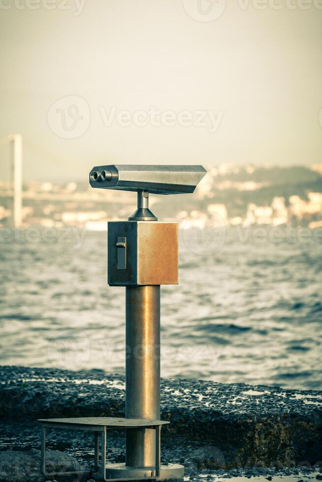 Telescope overlooking for the sea photo