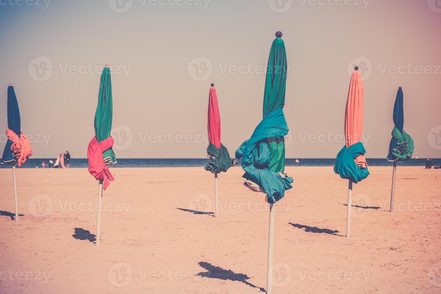 The famous colorful parasols on Deauville beach photo