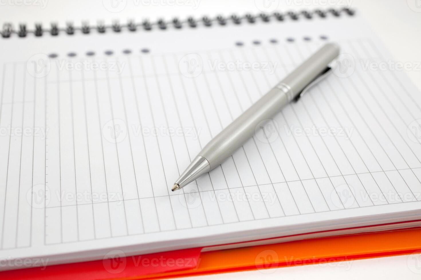pen and paper orange notebook photo