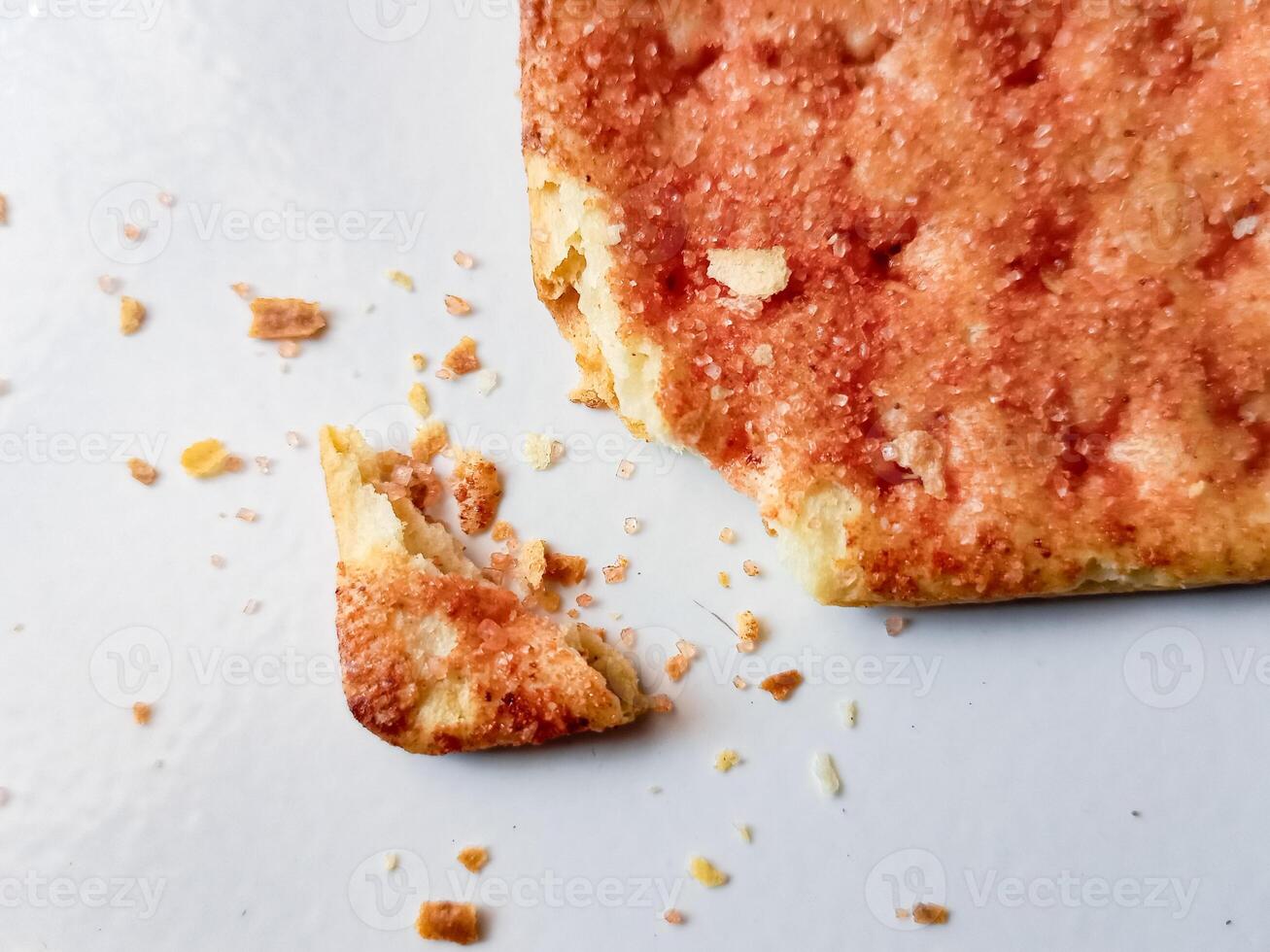 Biscuits flavoured with abon sapi or shredded beef, namely dried beef flakes, isolated on a white background. photo
