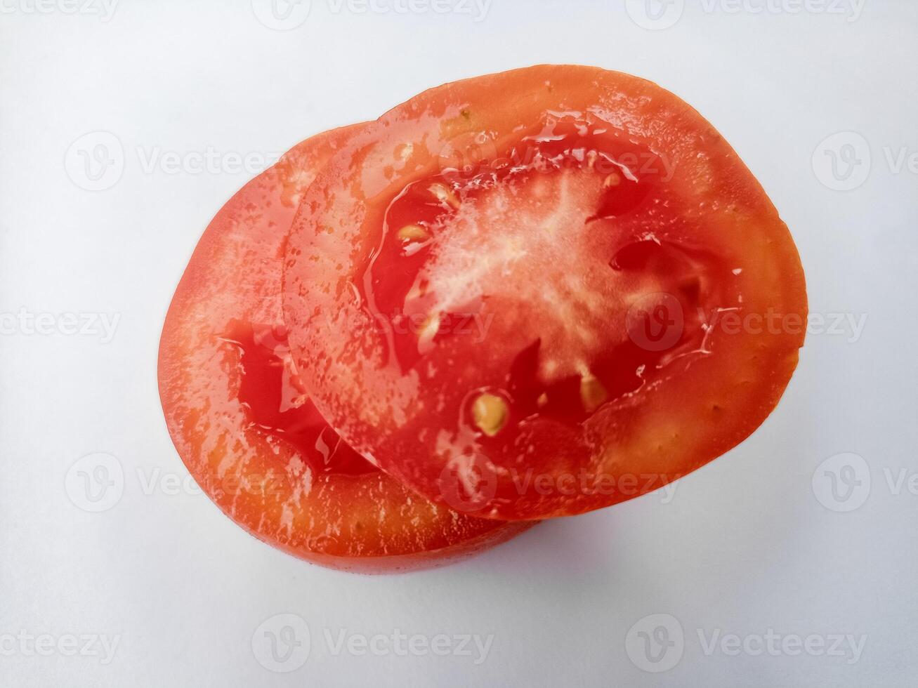 Half of fresh cherry tomato isolated on white background photo
