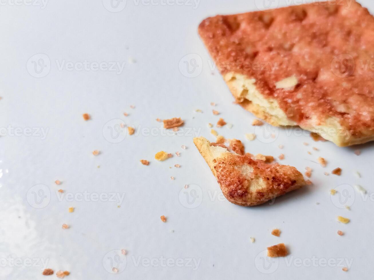 Biscuits flavoured with abon sapi or shredded beef, namely dried beef flakes, isolated on a white background. photo