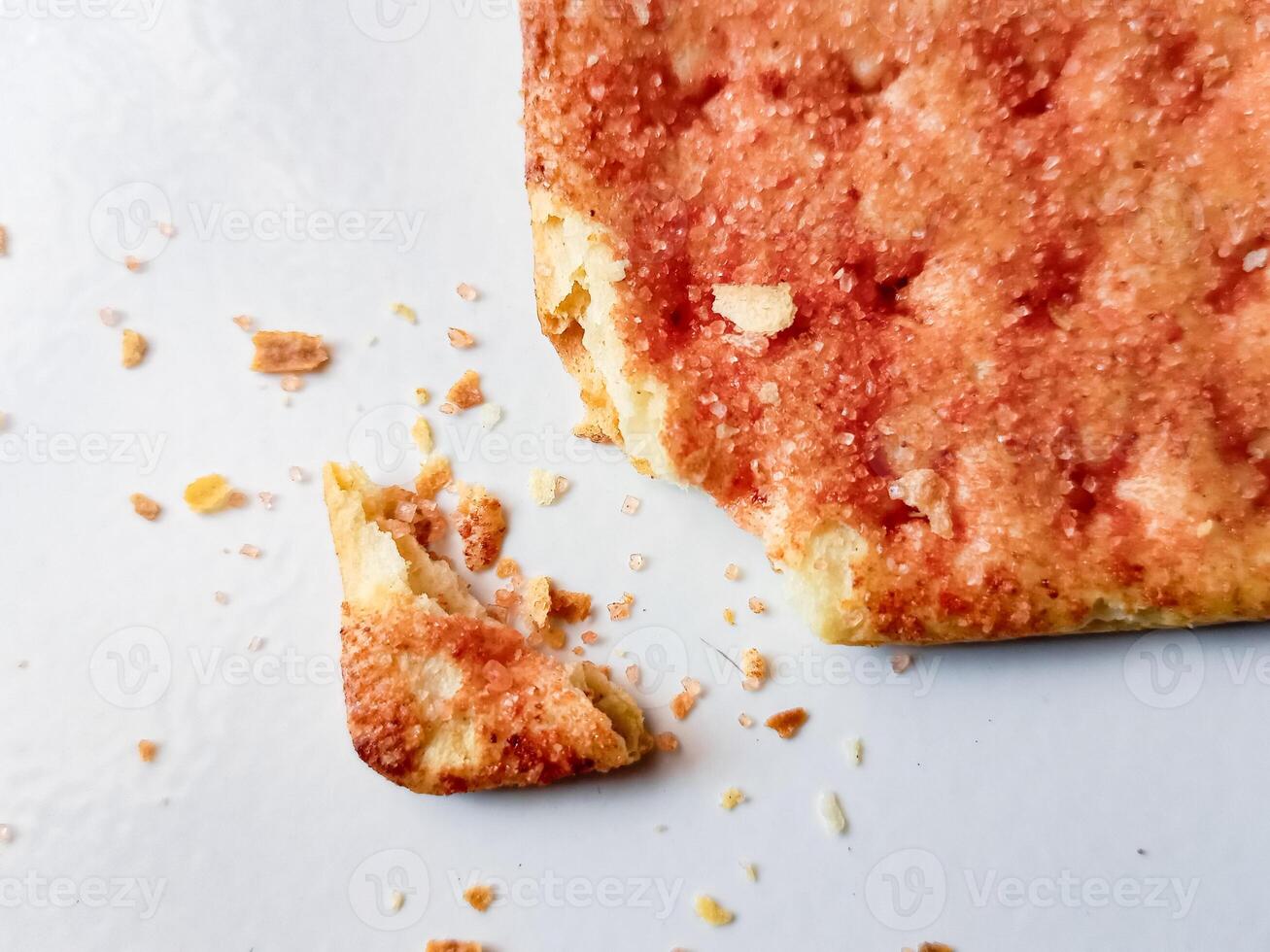 Biscuits flavoured with abon sapi or shredded beef, namely dried beef flakes, isolated on a white background. photo