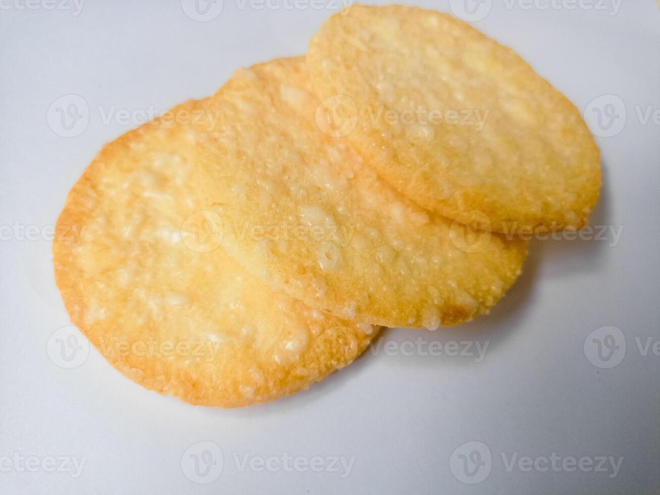Stack of Japanese rice crackers, Sembei isolated on white background photo