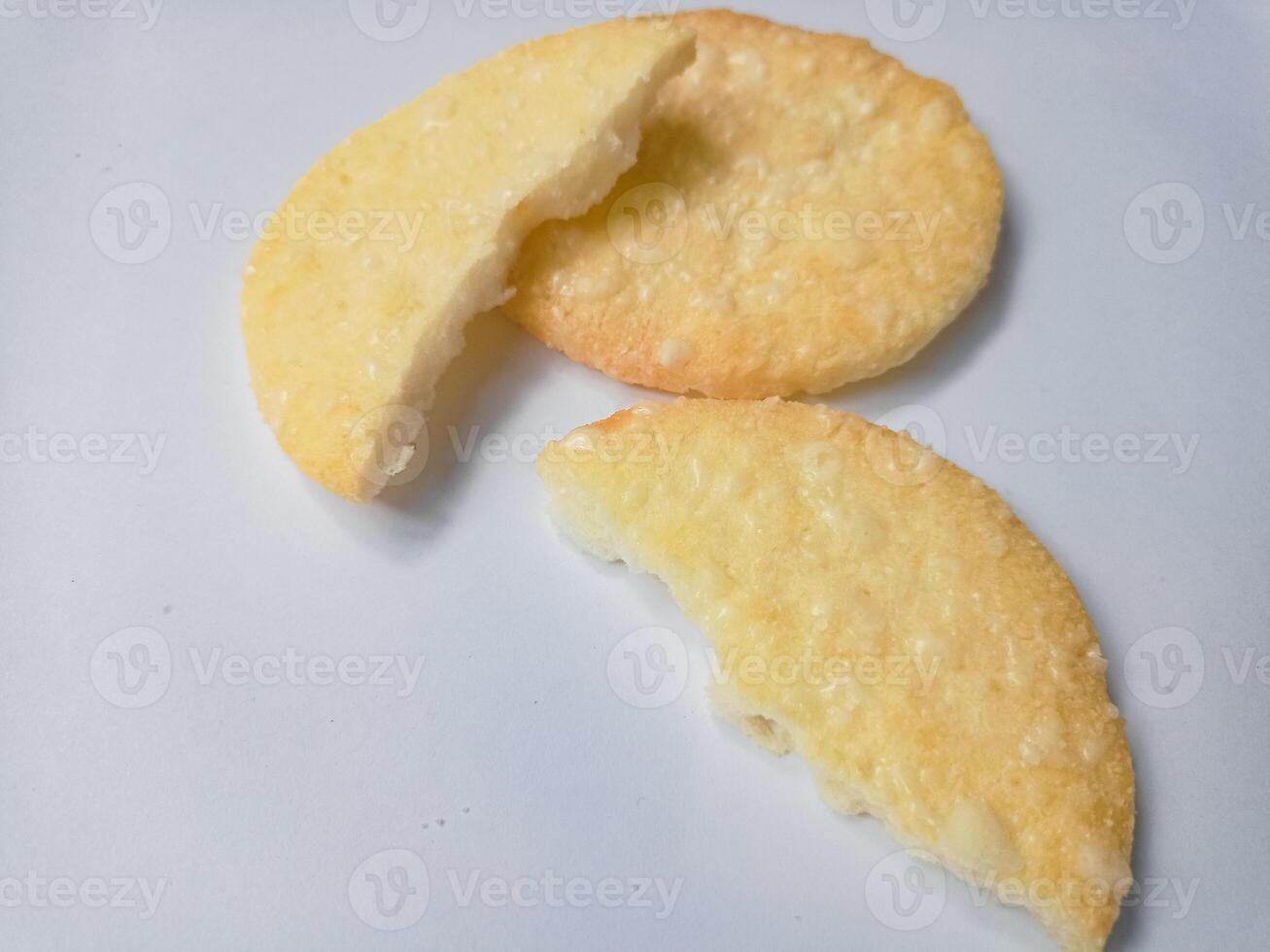 Stack of Japanese rice crackers, Sembei isolated on white background photo