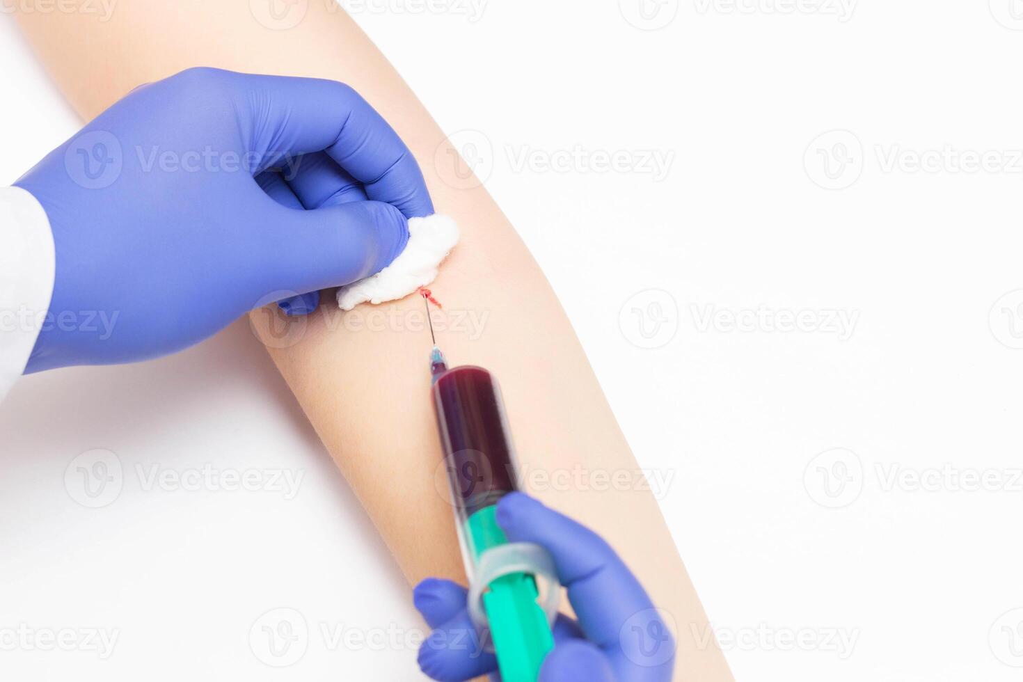 The doctor takes a blood test for the study of thyroid hormones and autoimmune diseases, close-up, copy space, venereology photo