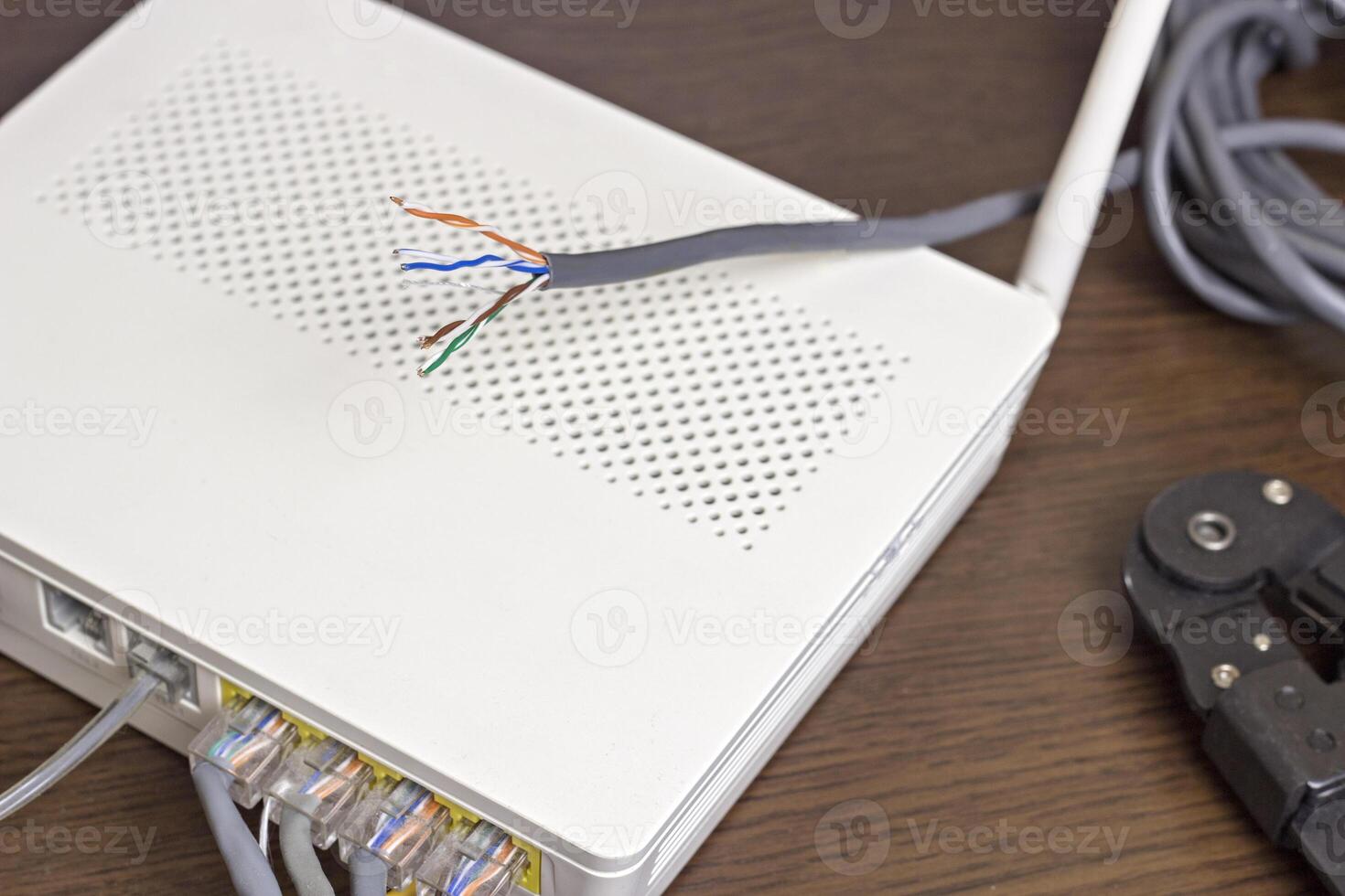 On the table, the network cable and modem, router photo