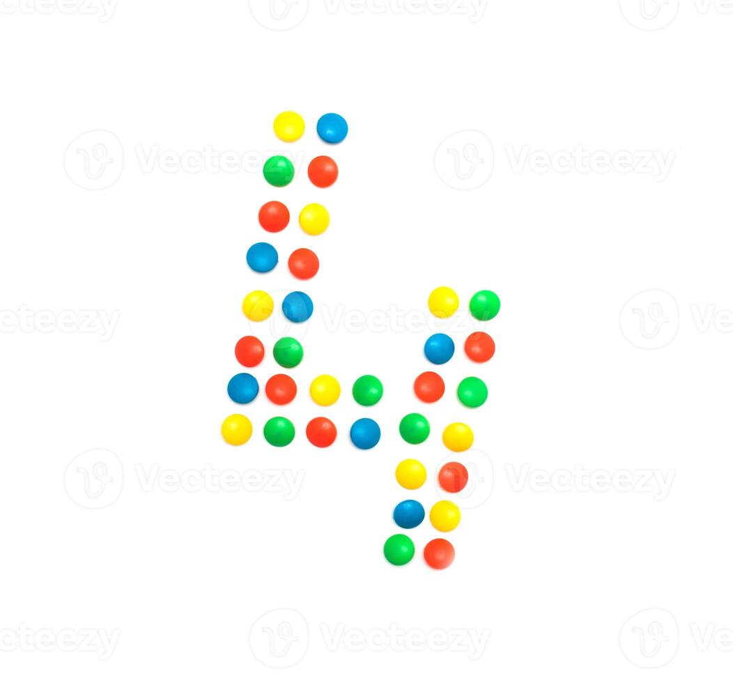 Children's numbers laid out from a multi-colored mosaic figure number 4, alphabet photo
