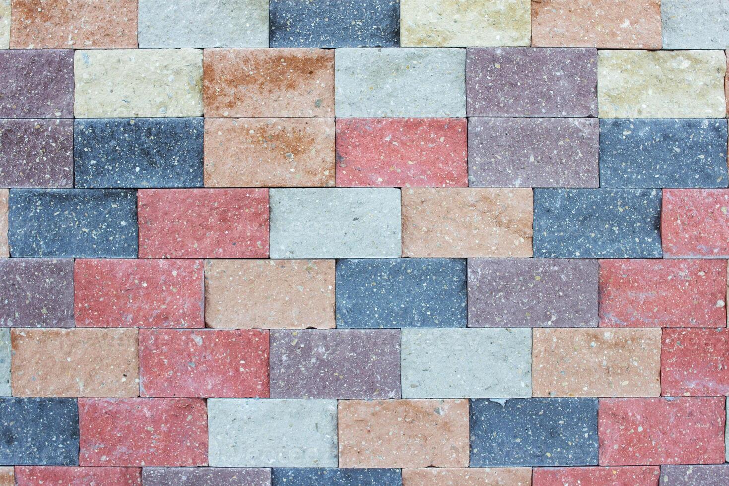 Modern multicolored brick wall, texture, background, construction photo