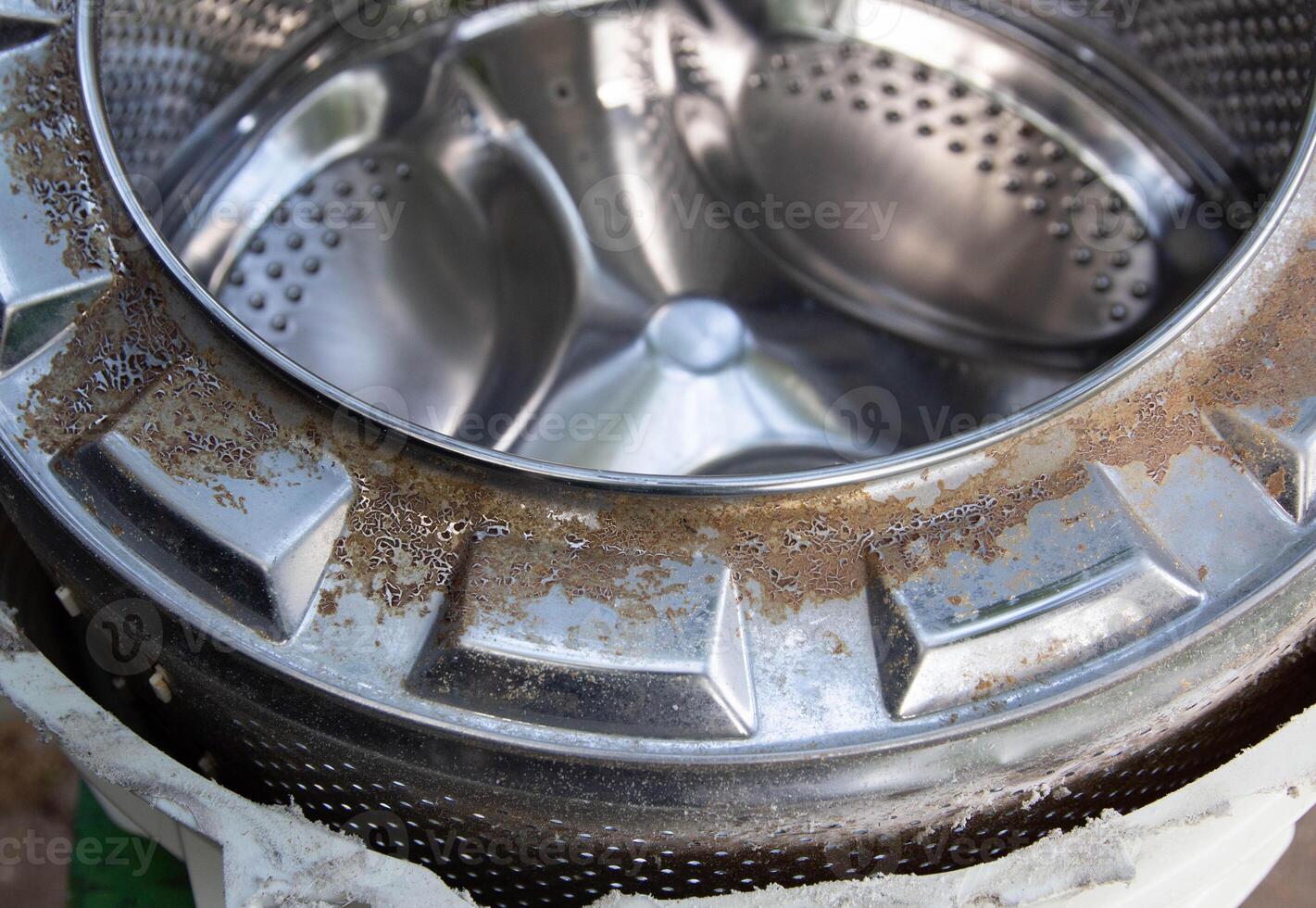 Disassembling the washing machine drum to replace the cross. Washing machine breakdown and repair, close-up photo
