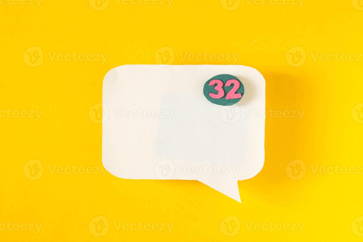 Symbol sign message from a white paper on a yellow background, social network, message, symbol photo