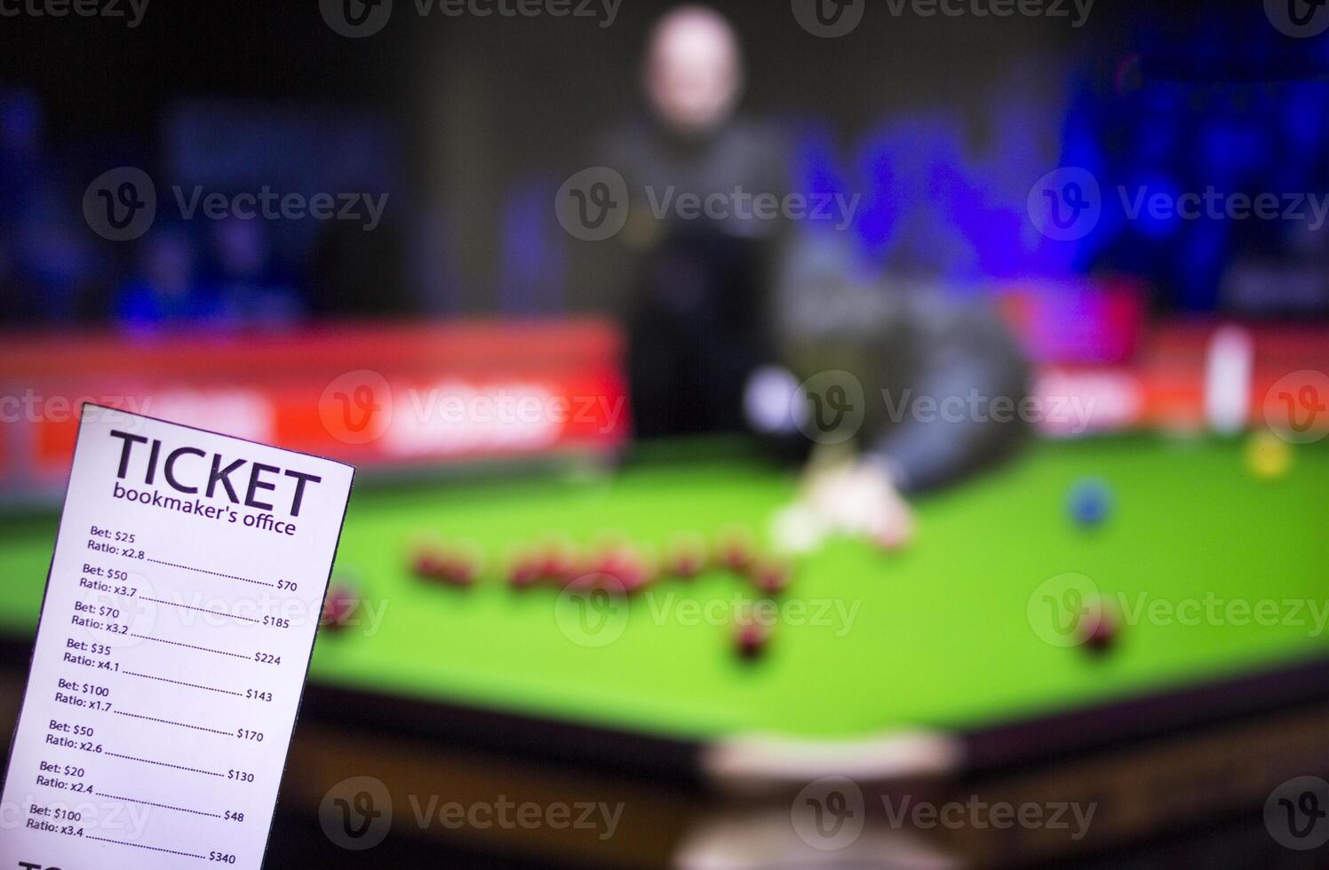 Bookmaker ticket on the background of the TV, which shows a game of snooker, sports betting, bookmaker ticket photo