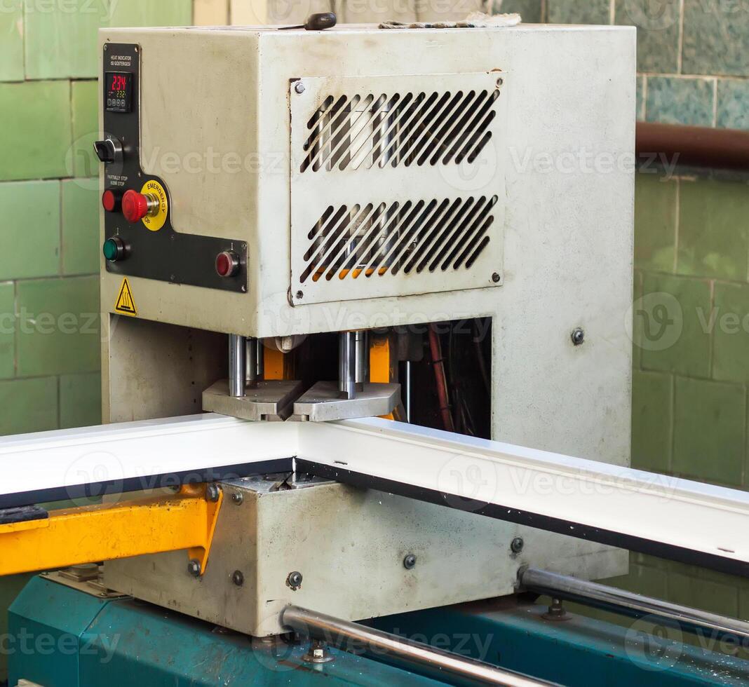 Production of pvc windows, gluing of plastic corners of windows, machine for the production of pvc windows, profile photo
