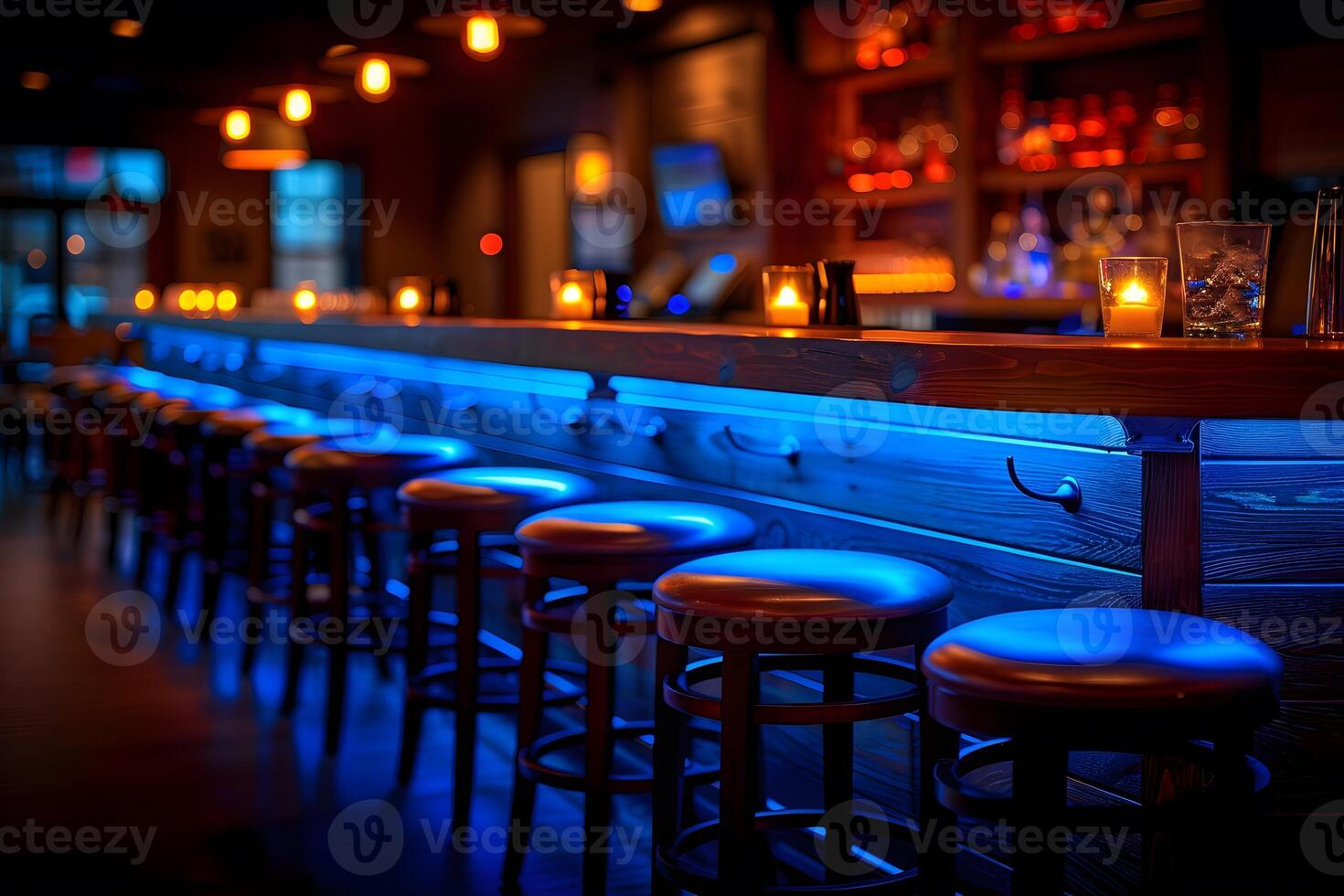 Cozy Evening Ambiance in Modern Bar Setting with Blue LED Lighting photo
