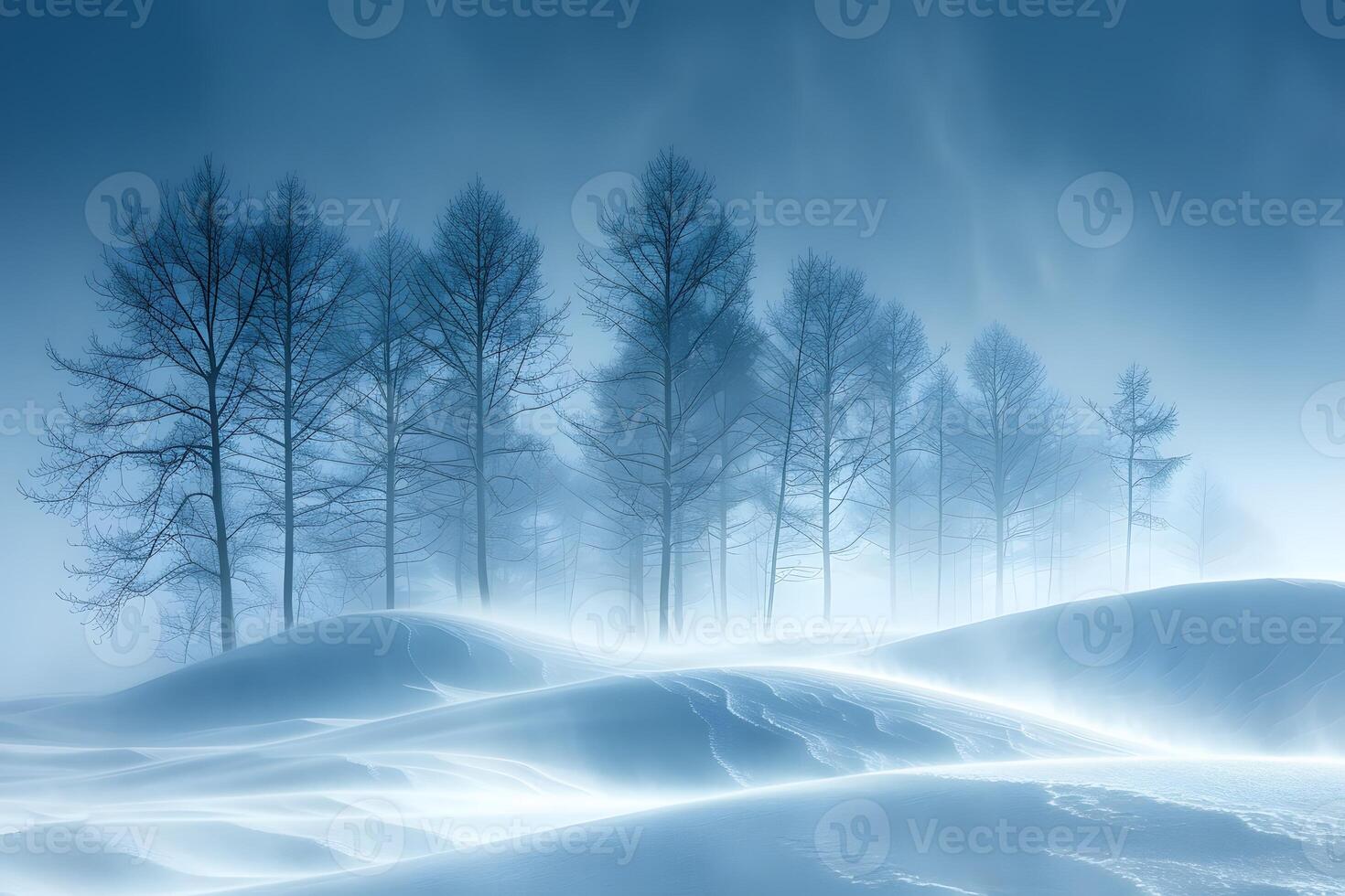 Mystical Winter Landscape with Snowy Hills and Bare Trees at Dawn photo