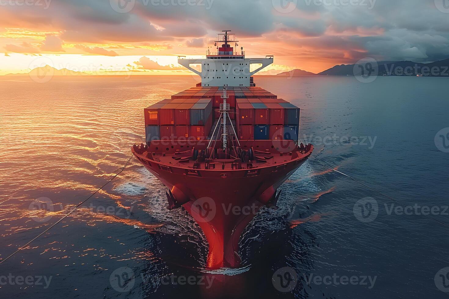Majestic Cargo Ship Journey at Sunset - Maritime Trade and Transportation photo