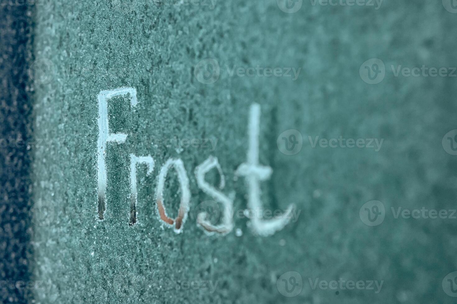 Frosted Surface With Inscription Freeze Captured in a Cold Environment photo