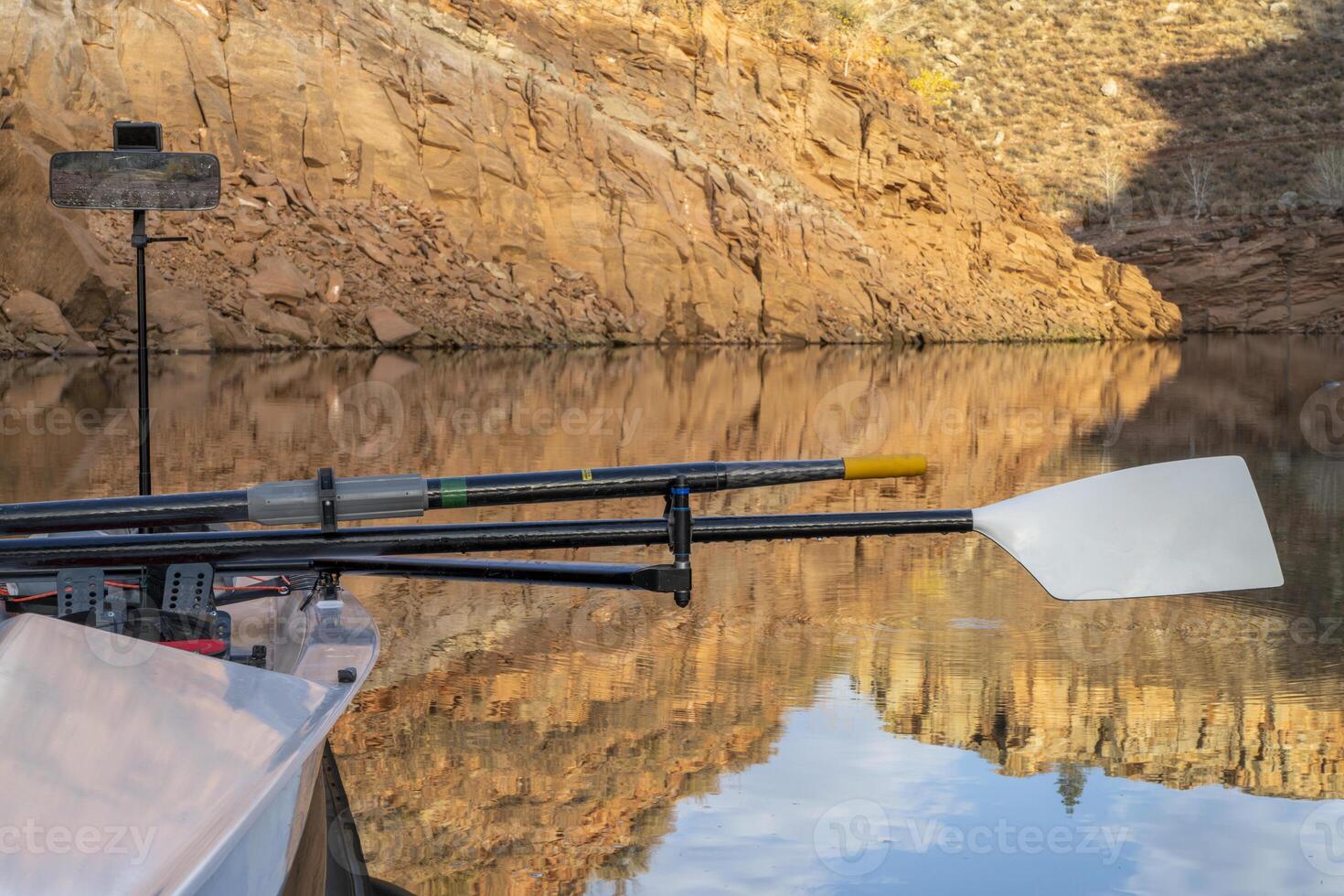 oars of coastal sculling shell in sandstone canyon of Horsetooth Reservoir in Colorado in fall scenery photo
