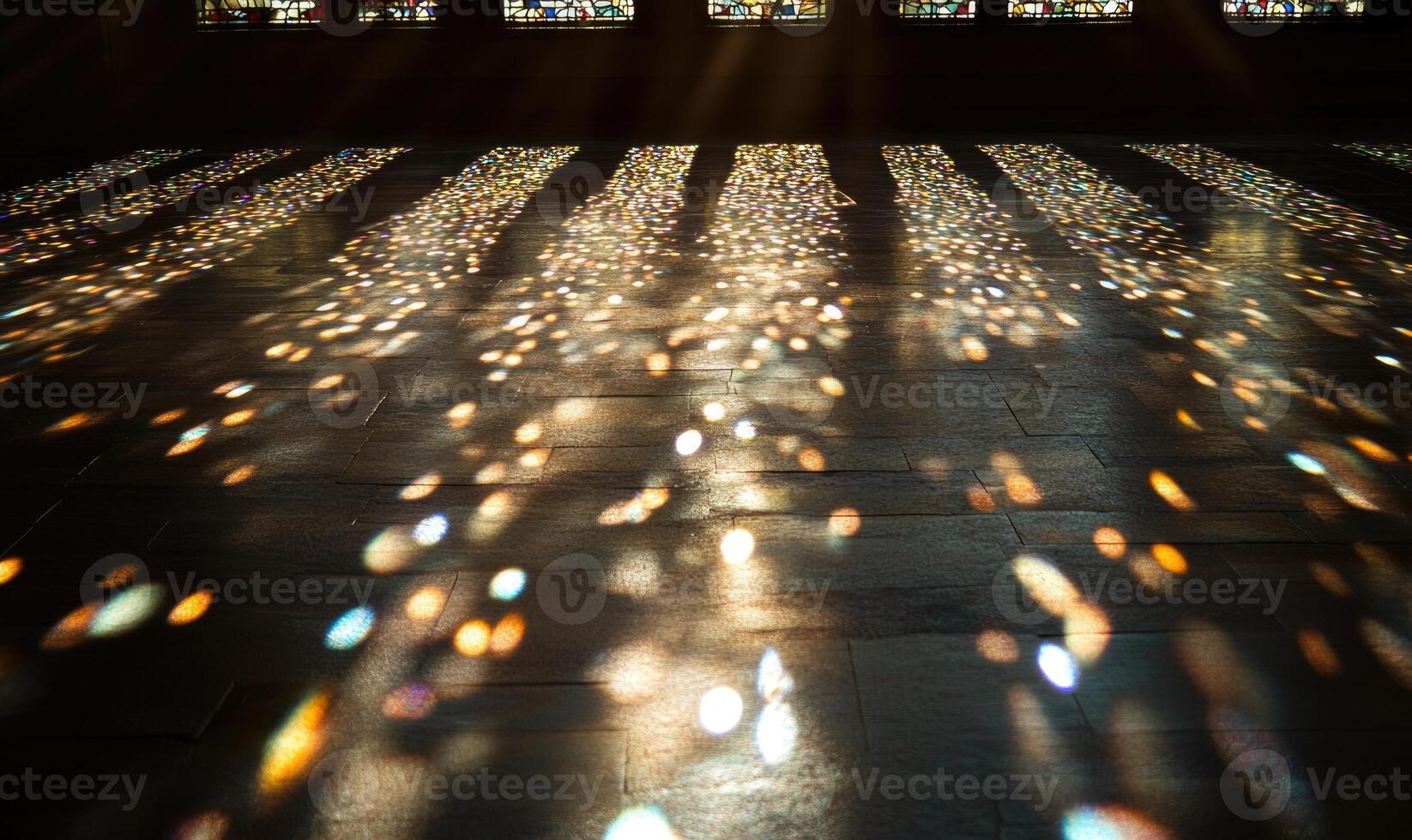 The image is of a room with a floor that is covered in a pattern of light photo