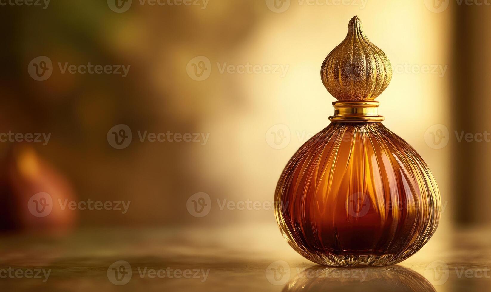 A bottle of perfume with a gold top photo