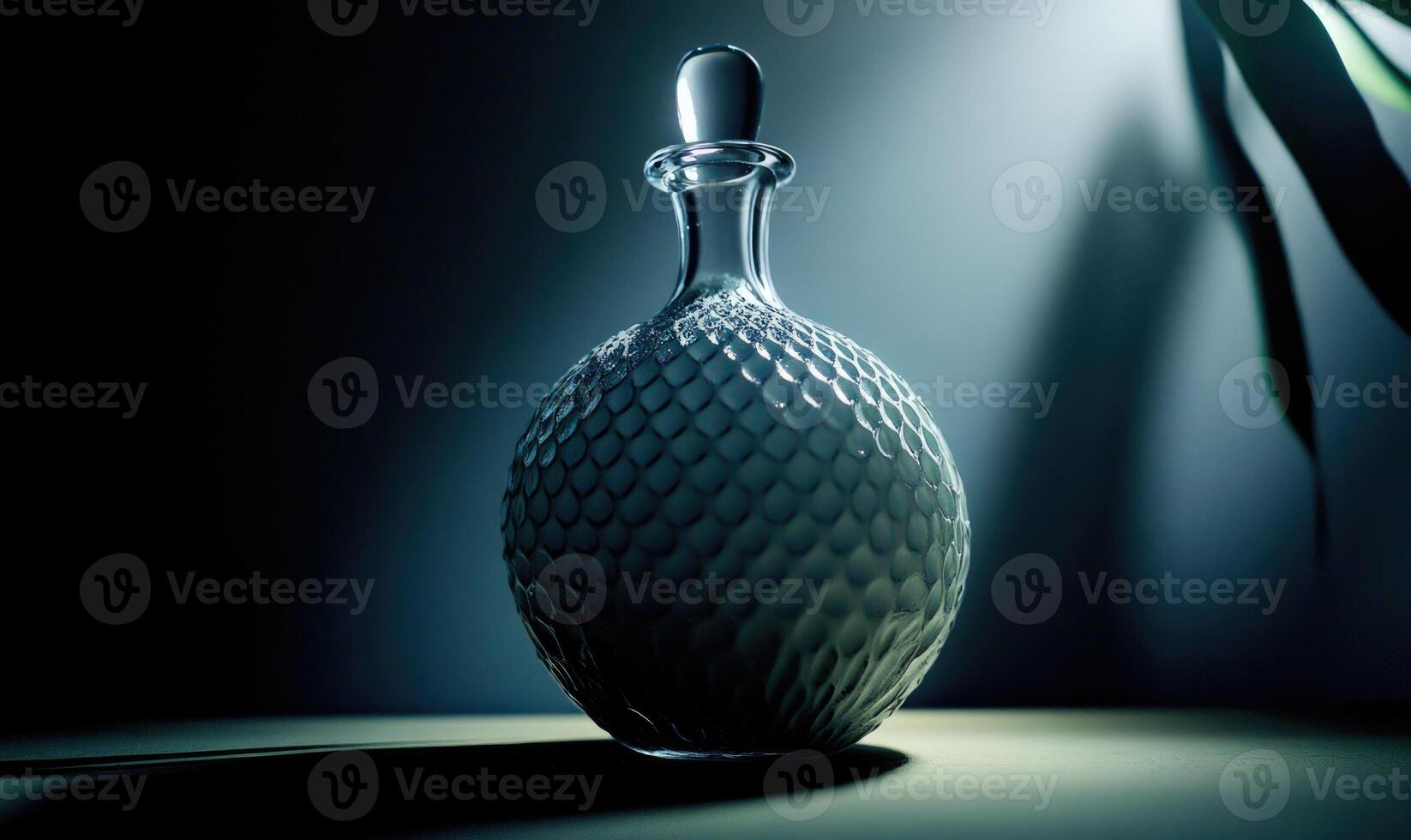 A glass vase with a blue top sits on a table photo