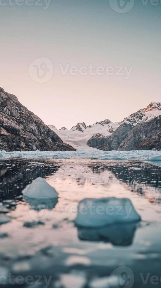 Glacier fragments floating on water surface next to mountain range , wallpaper art photo