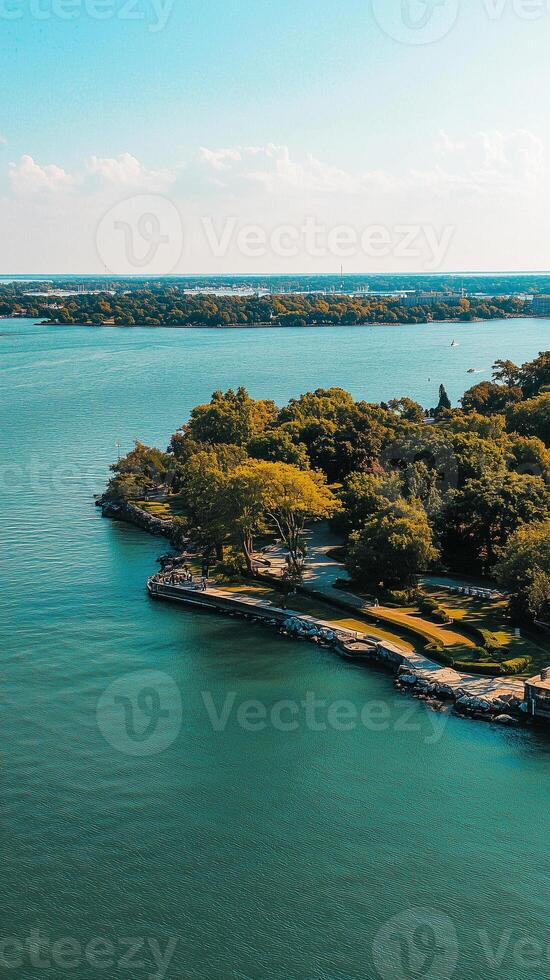Peninsula extends into water toward distant shore , photorealistic wallpaper photo