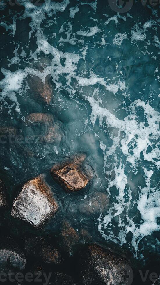 Tide pools between rocks along the shoreline, wallpaper photo