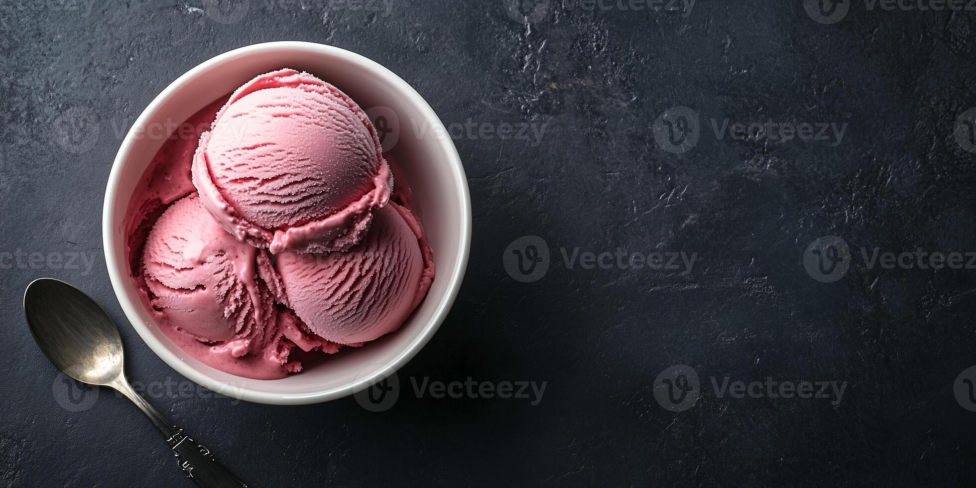 Bowl with a single scoop of ice cream, served with a small spoon resting nearby, culinary photography photo