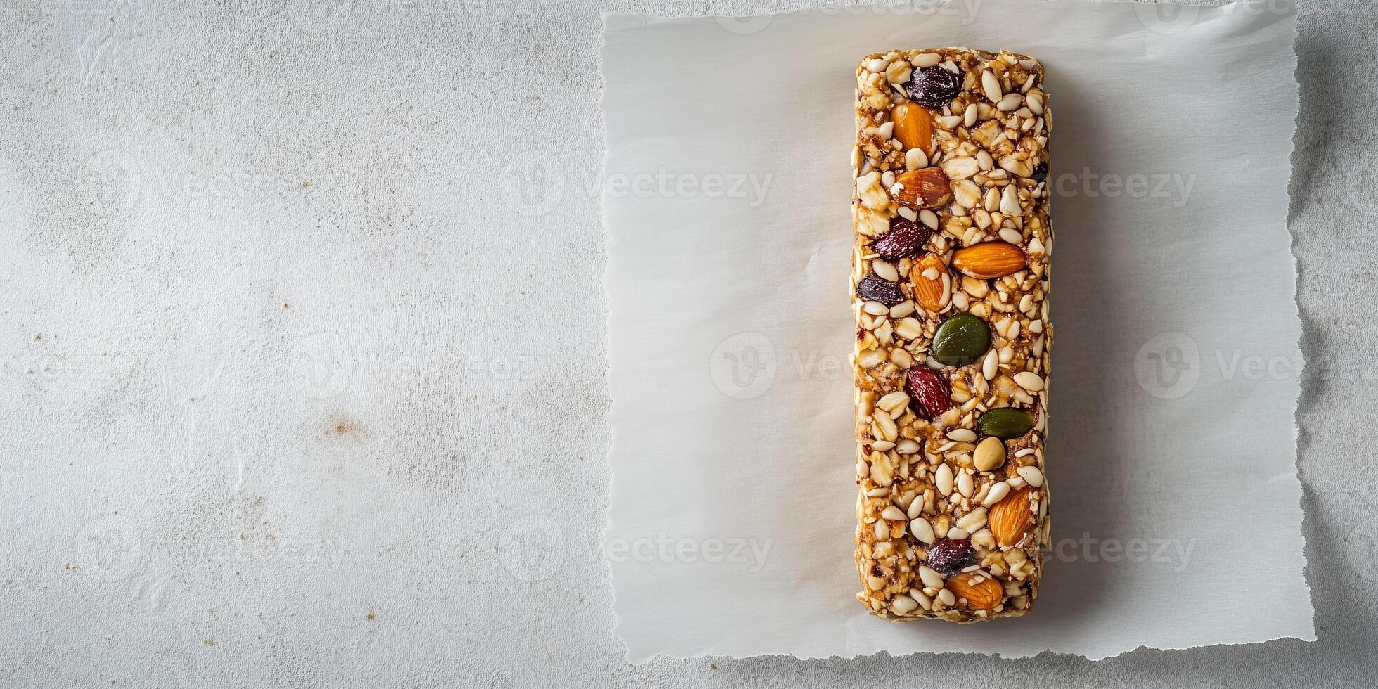 Single energy bar with grains and seeds on parchment paper, photorealistic food photo