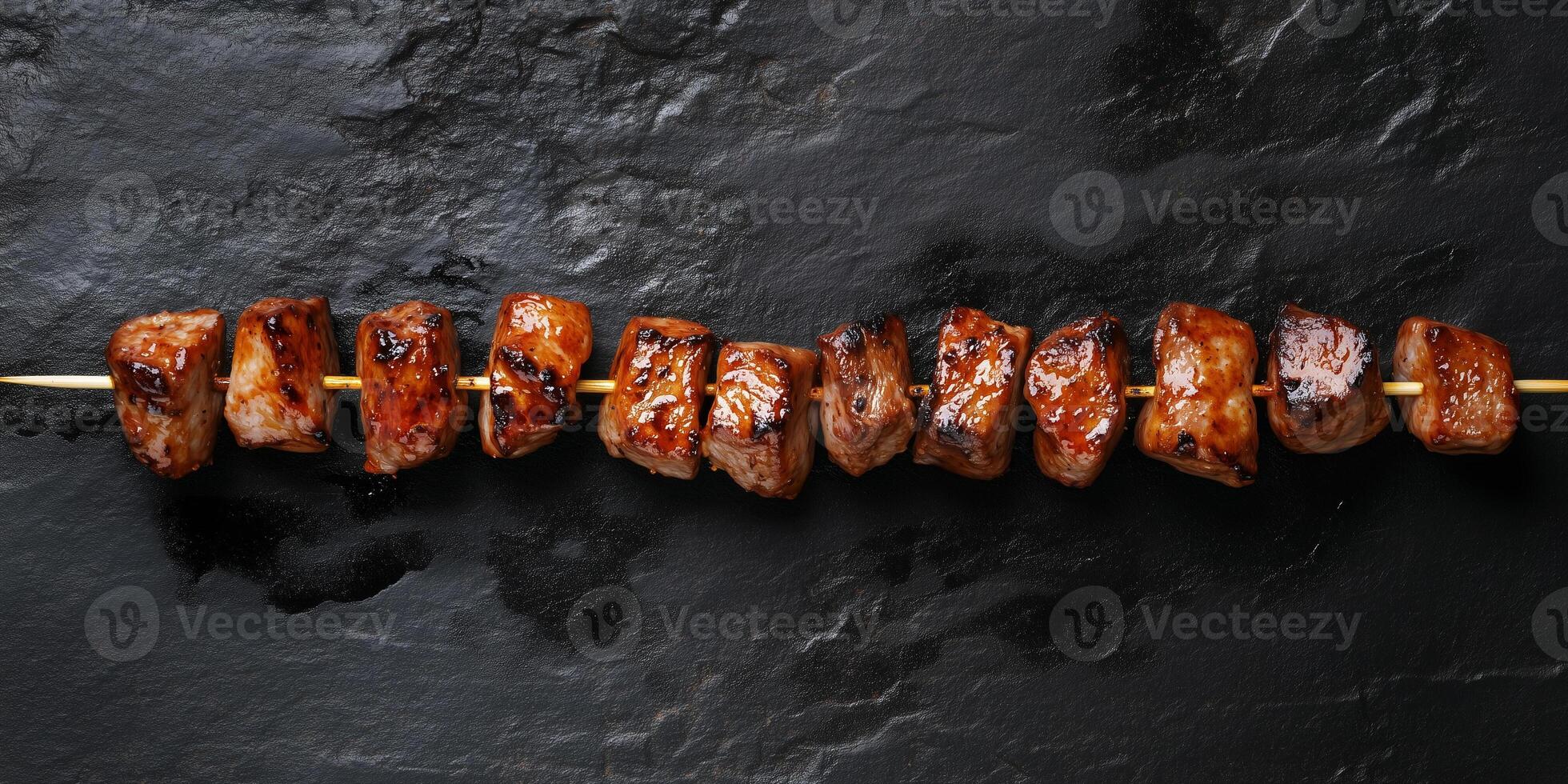 Skewer with small grilled meat pieces, evenly spaced, lying on a flat surface, photorealistic food photo