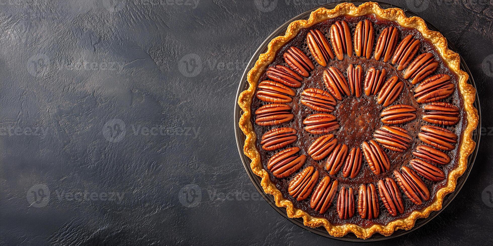 Pecan pie with a glossy top, filled with whole pecans arranged in a circular pattern, meal photography photo