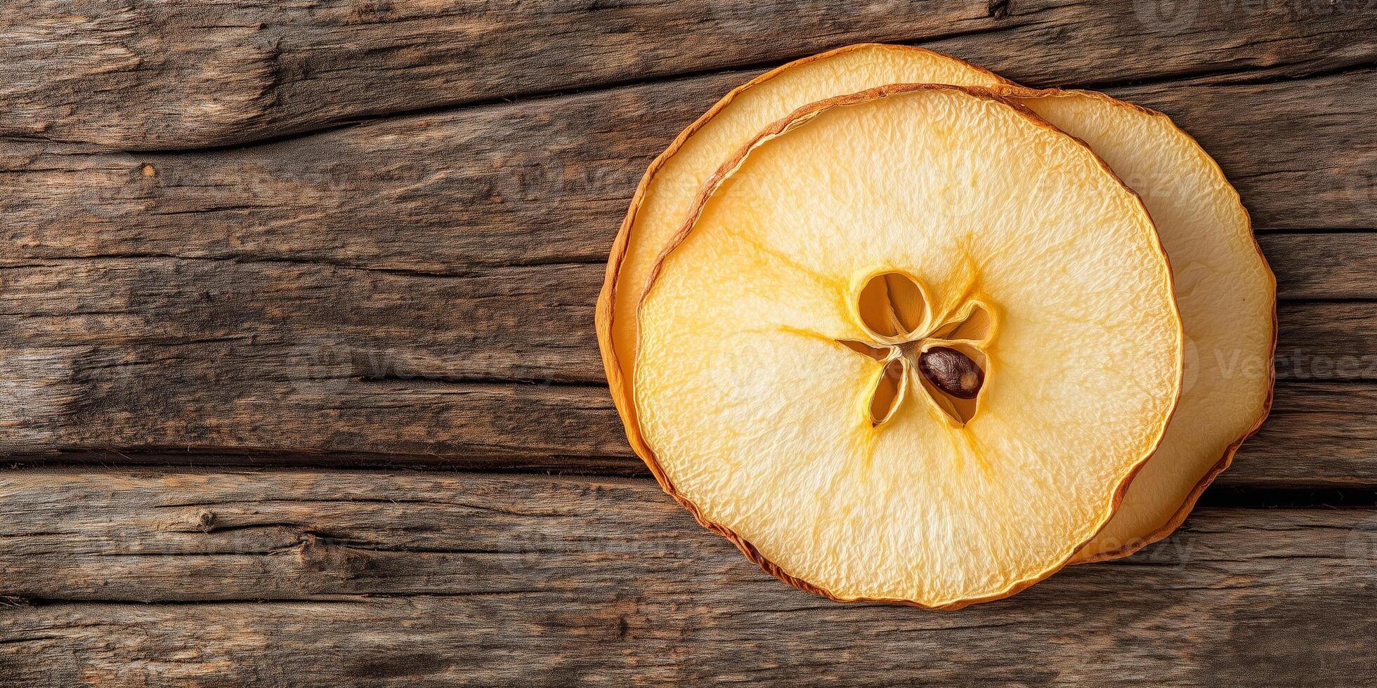 Single dried apple slice resting on another, meal photography photo