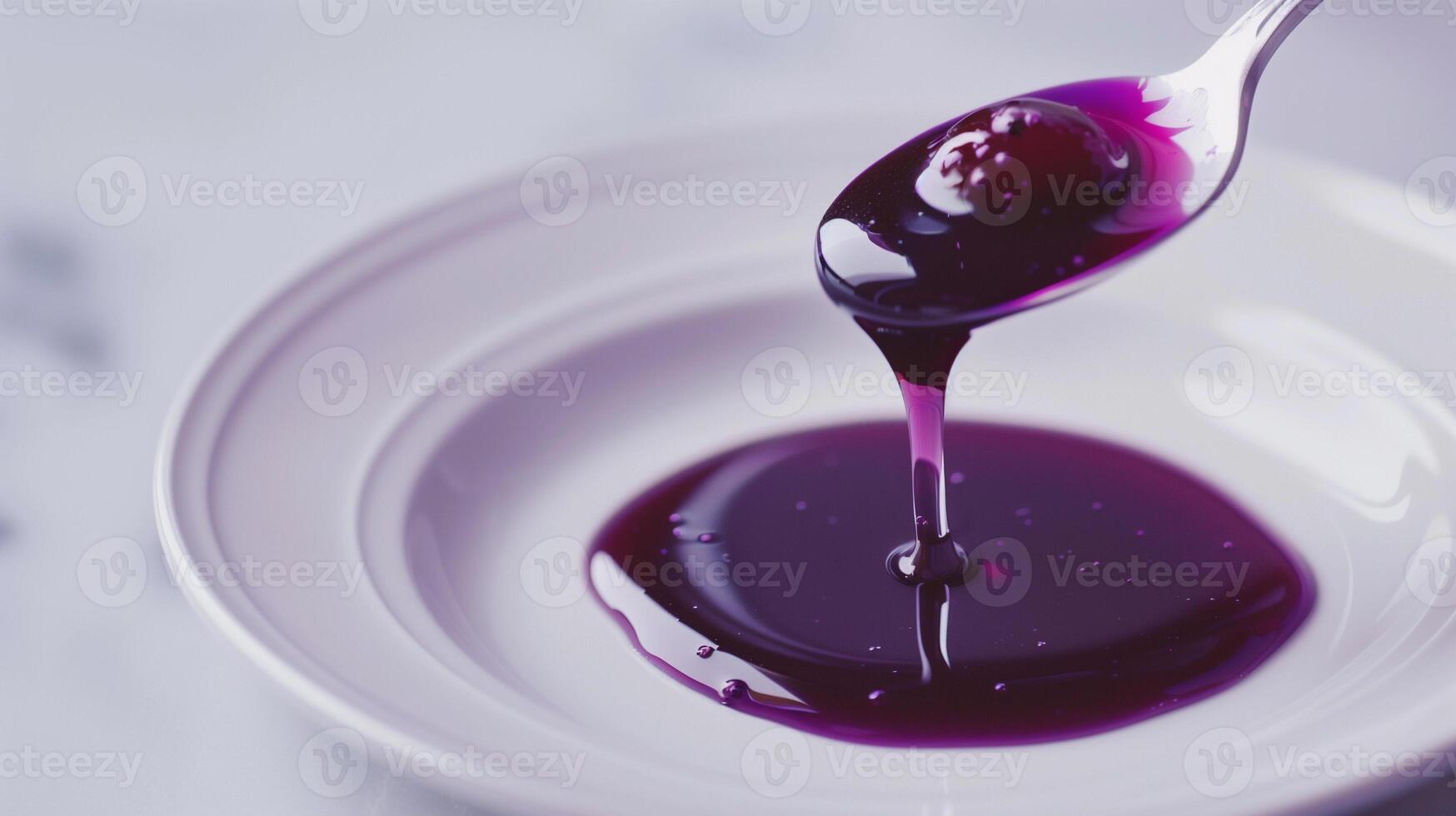 Spoon dripping purple fruit syrup onto a clean white plate, culinary photography photo