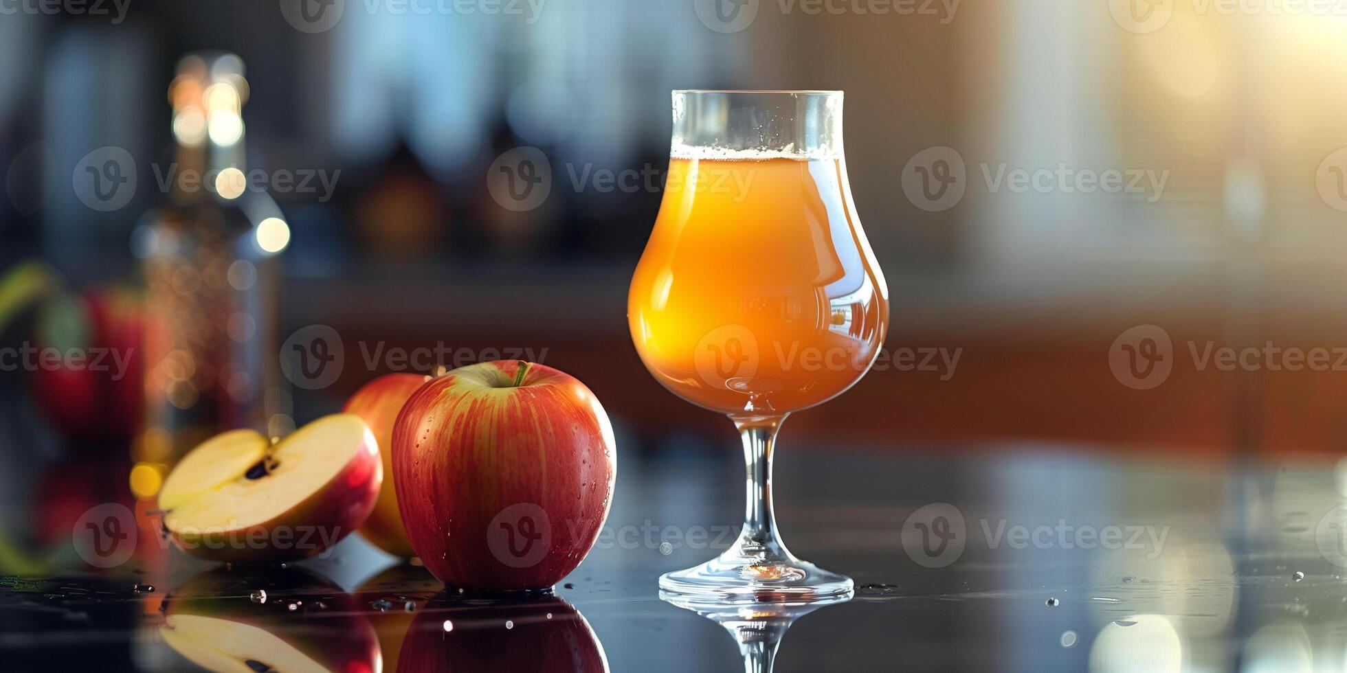 Glass of apple cider on a reflective surface, with a bottle lying horizontally in the background, food photography photo