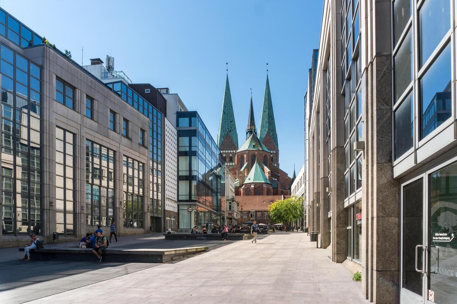 Lubeck, Germany-august 12, 2022-Walking through the streets of Lubeck during a sunny day photo