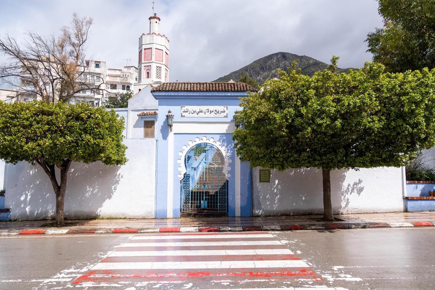 Chefchaouen, Morocco -march 26, 2024-Walking through the streets of Chefchaouen the blue city during the cloudy day photo
