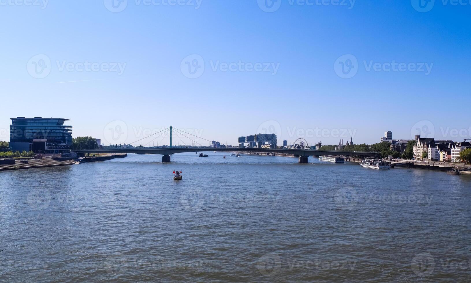 View over the Rhine in Cologne in Germany in fine weather with the famous buildings of the skyline in the background photo