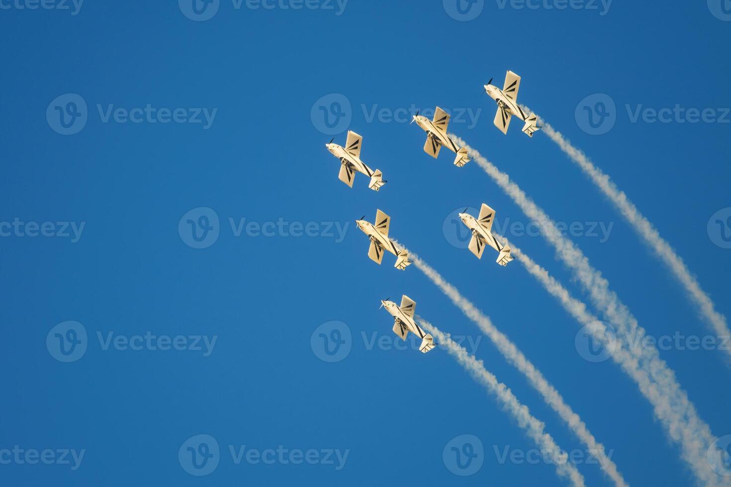 Stunt aerobatic planes performing stunts in air photo