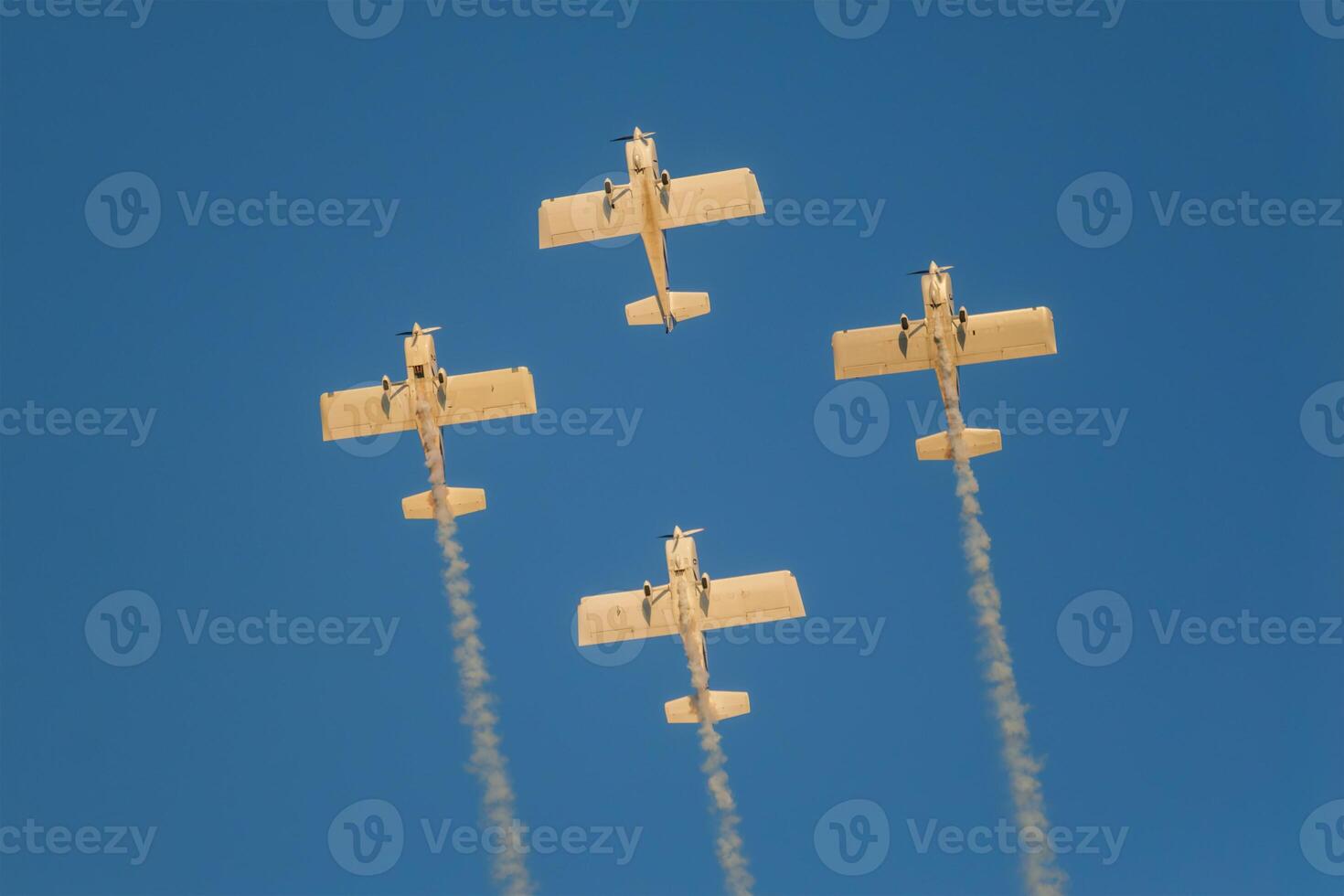 Stunt aerobatic planes performing stunts in air photo