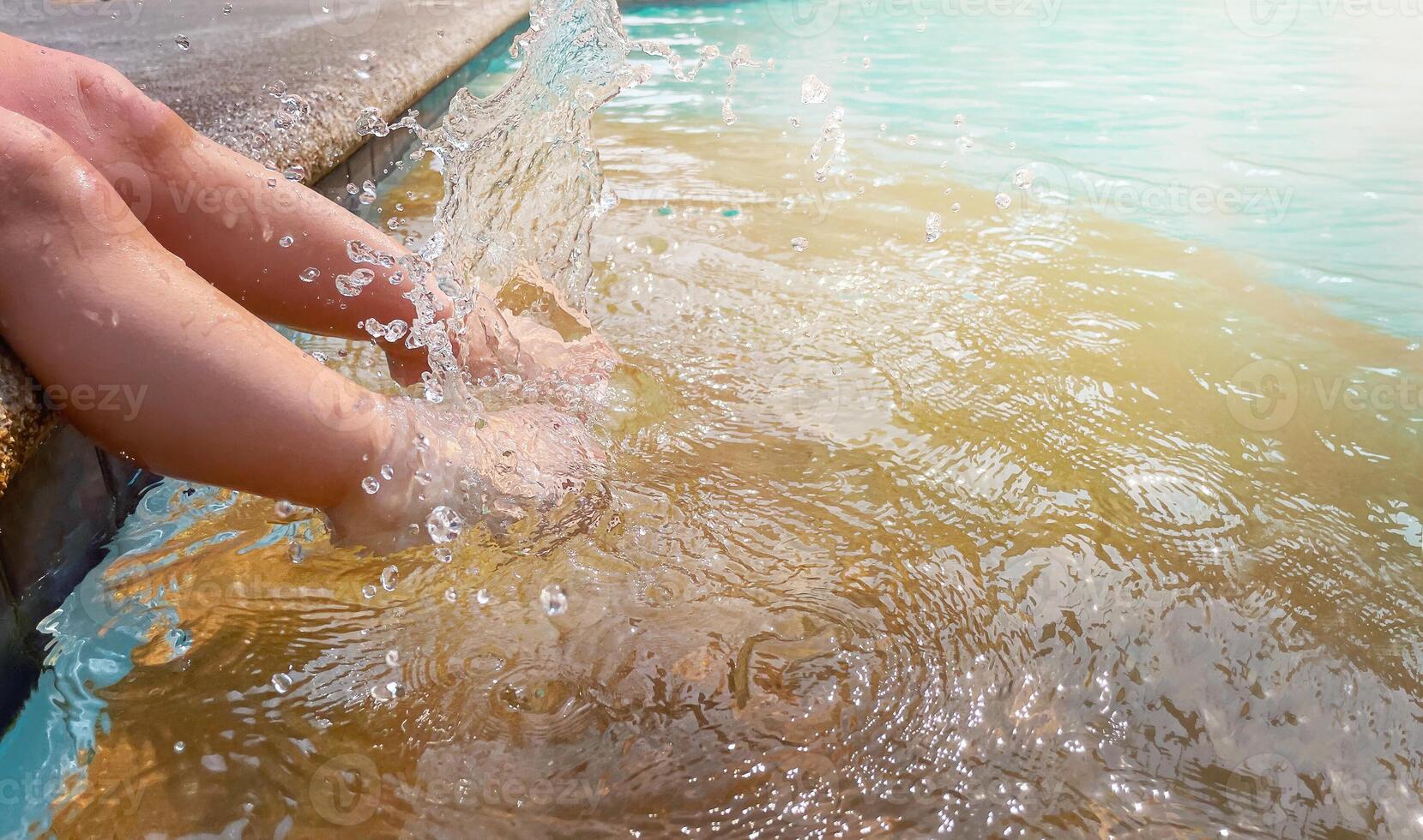 Baby on swiming pool photo