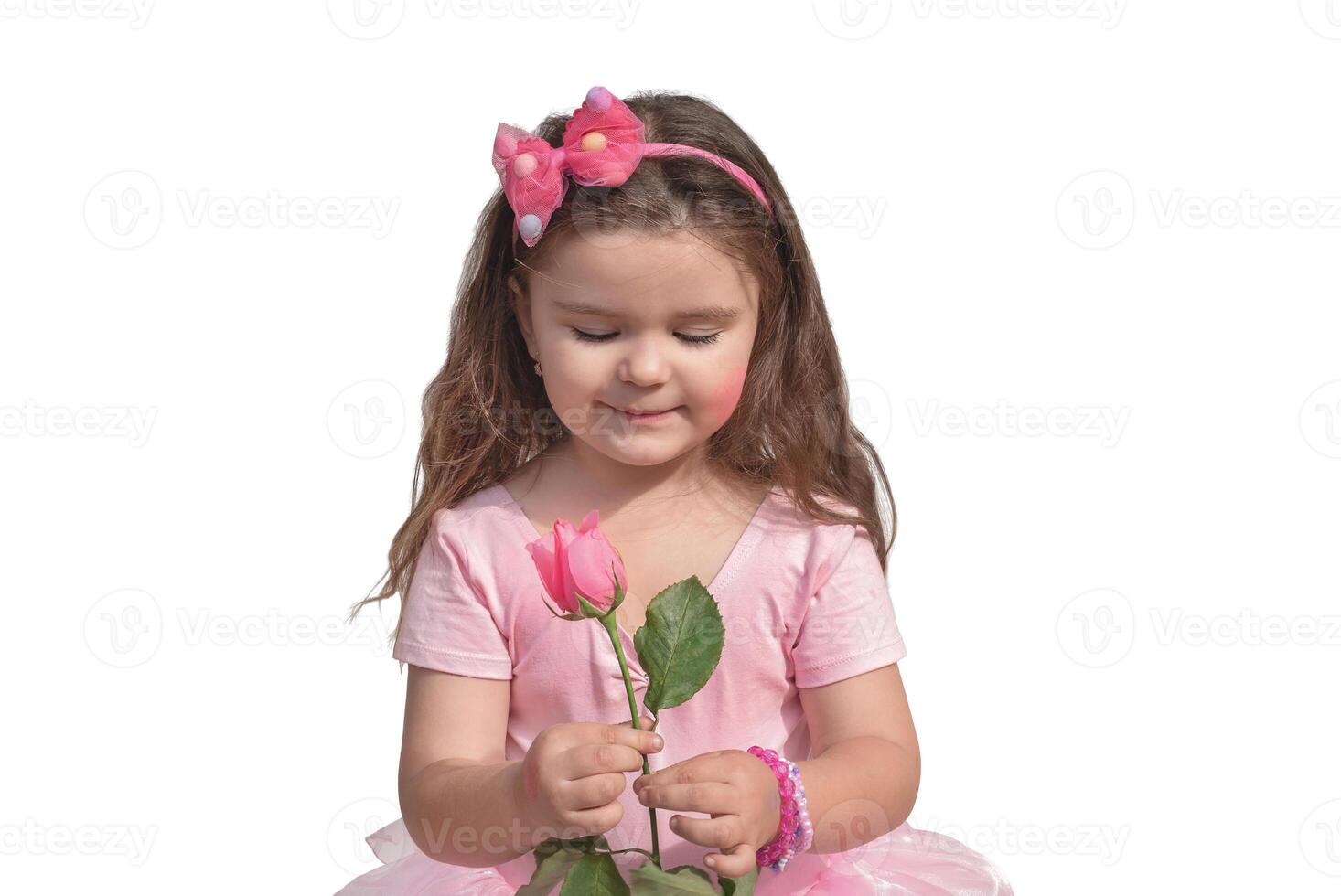 Child with a rose isolate photo
