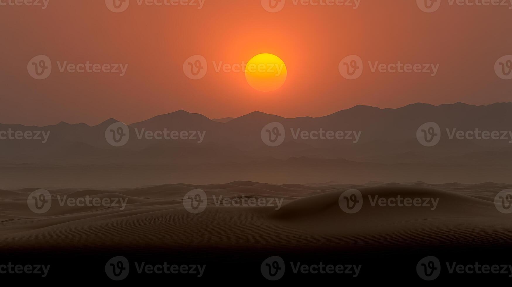 The sun sets over rolling sand dunes, painting the sky in vibrant orange and soft purple hues photo