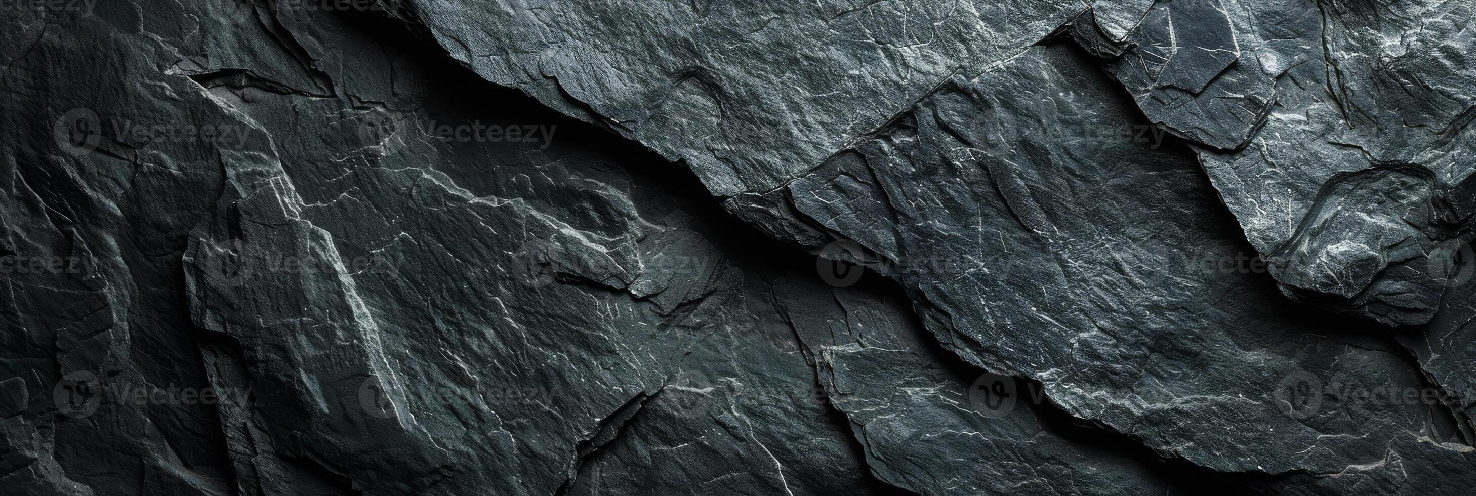 Dark Slate Stone Texture Background creates a rugged and natural vibe in design projects photo