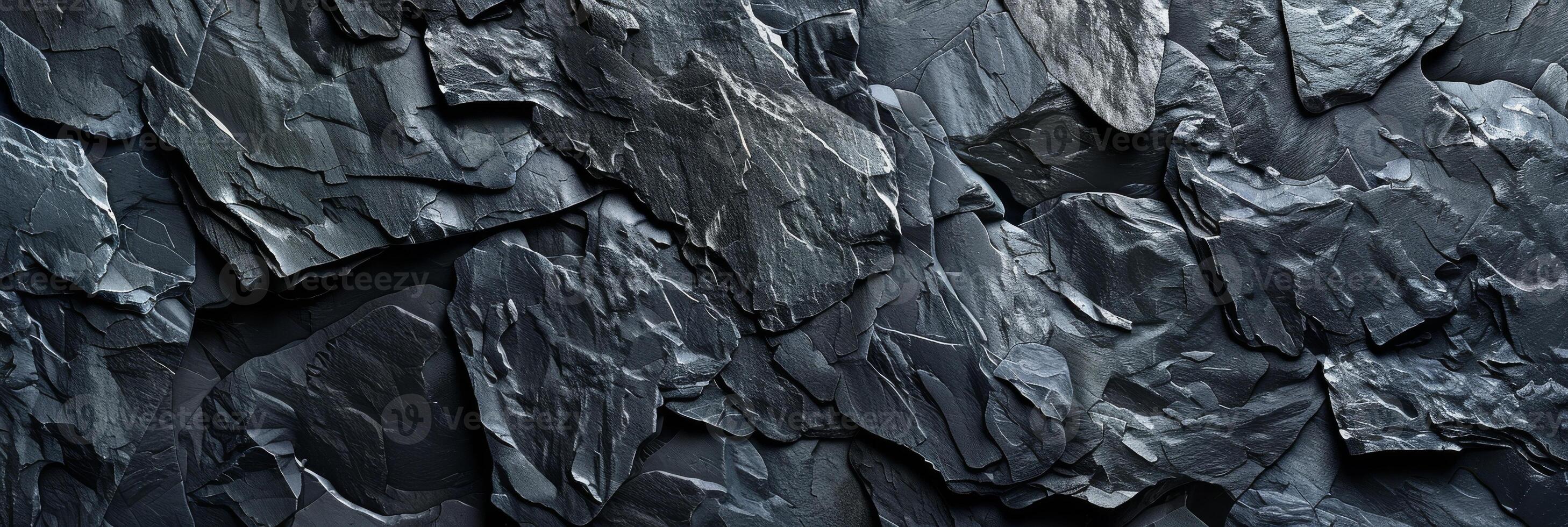 Dark Slate Rock Texture Background for an Abstract, Natural, and Rugged Outdoor Setting photo