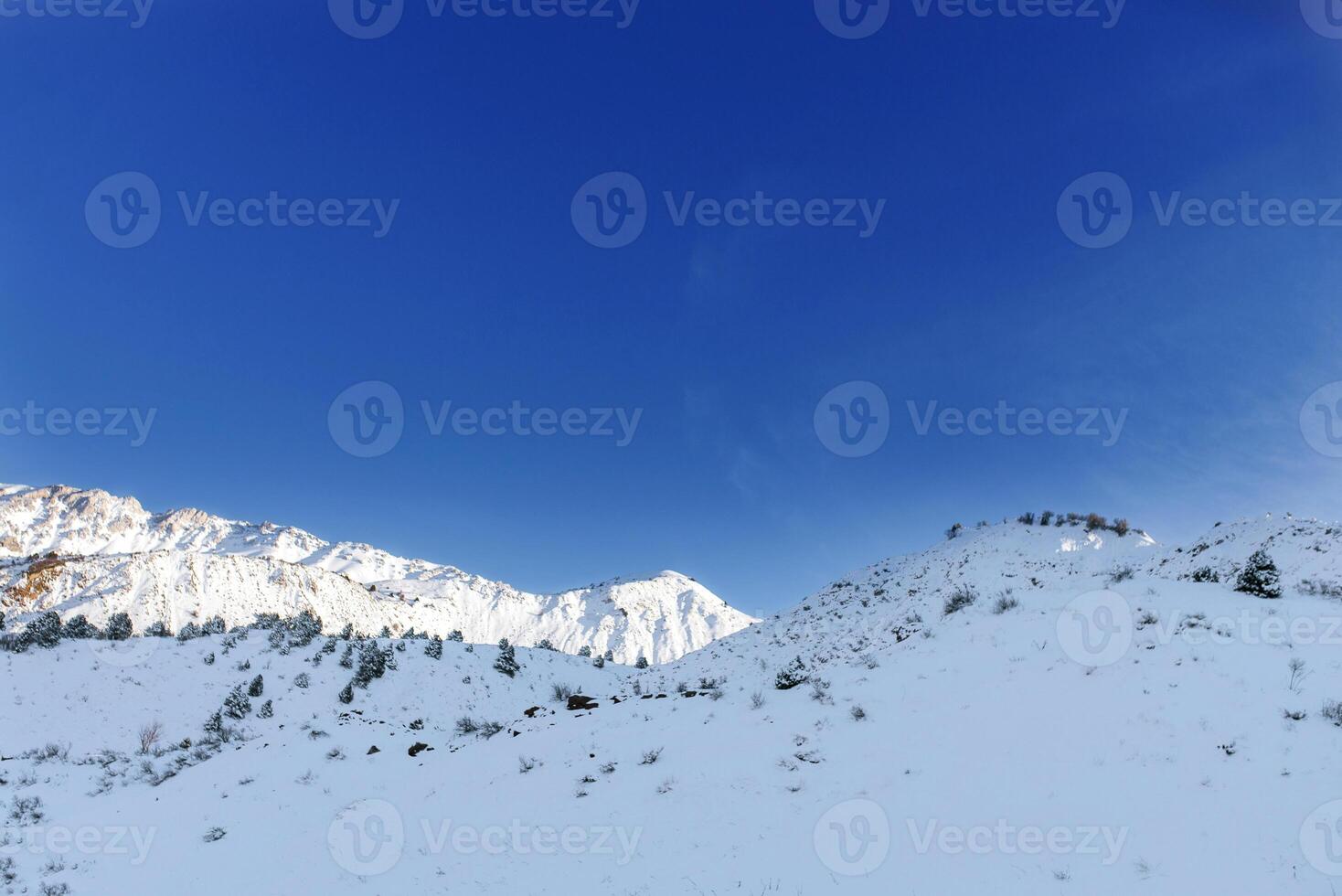 Tian Shan mountain system in Uzbekistan in winter on a Sunny clear day photo